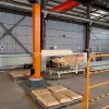 Dual-Station Single Column Palletizer, customized dual‑lane palletizing cell with two pallet stations for 15KG 20KG 25KG 30KG bags of white sugar, PLC control automatic palletizer with customized grippers, can be CE certificated.