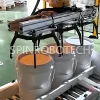 Single Column Drums Palletizer, customized clamp-type gripper for barrelled liquid products, Automatic palletizing machine with clamping gripper for 25kg 30kg drum-packed paint, with strong CE certification. SPIN's Column rotating palletizer: Dual-station, continuous operation, no speed loss.