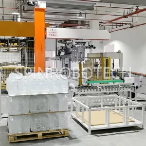 Integrated Palletizer, Integrated Palletizing Machine, Dual-Station Column Palletizer for 28KG Bucket Mineral Water and Slip Sheets, Equiped with Custom Integrated Gripper, with CE certification. SPIN's Column rotating palletizer: Dual-station, continuous operation, no speed loss.