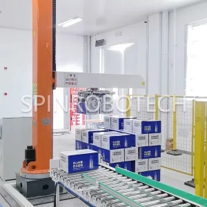 Dual-pick Dual-place Palletizer, Custom Dual-station Column Rotary Palletizing Machine, Equipped with Custom Integrated Gripper, for 6KG-12KG Boxed Water, with CE certification. SPIN's Column rotating palletizer: Dual-station, continuous operation, no speed loss.